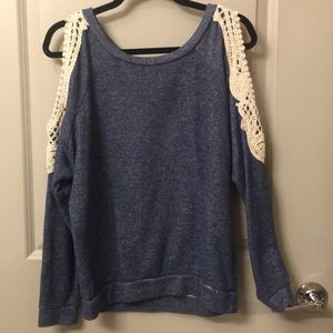 Blue cold sweater shoulder with embroidery
